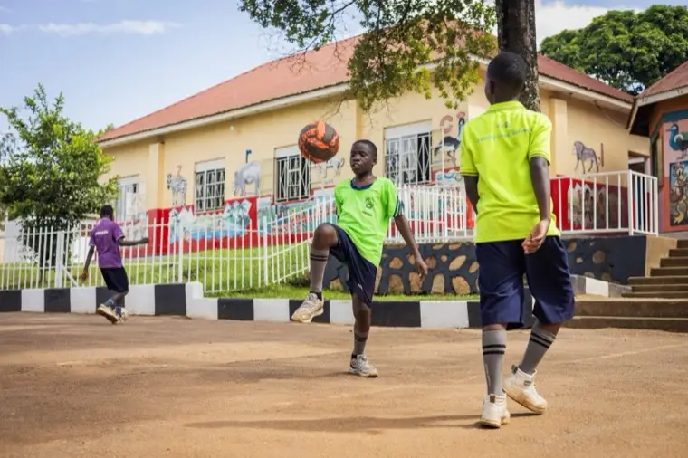 Learners playing football