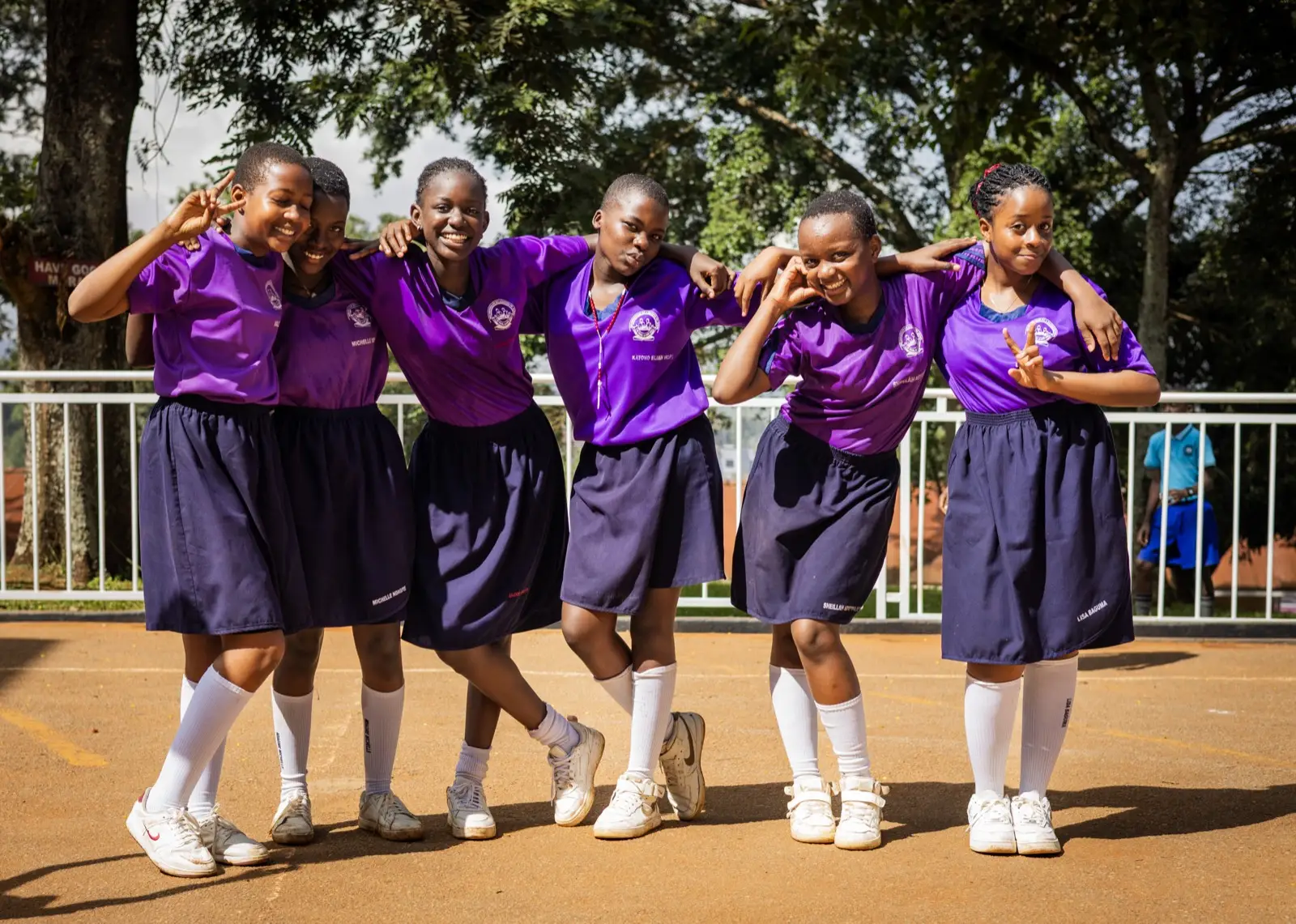 Learners in their purple uniform