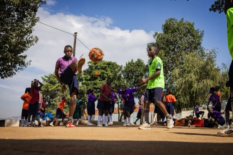 Learners shooting basketball