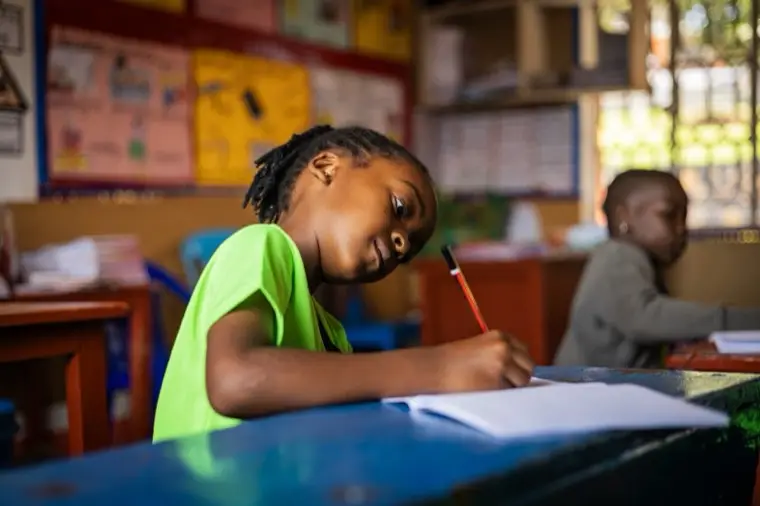 A learner writing in class
