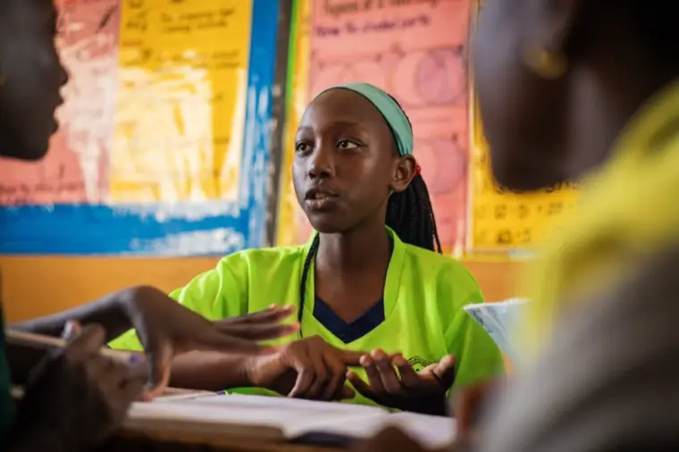 A learner reading aloud